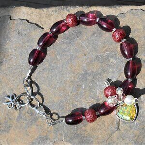 Bracelet with Tibetan silver charm featuring dragon scale inclusion and 8mm and